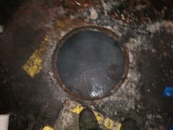 Rodding main sewer which was filled with baby wipes and grease